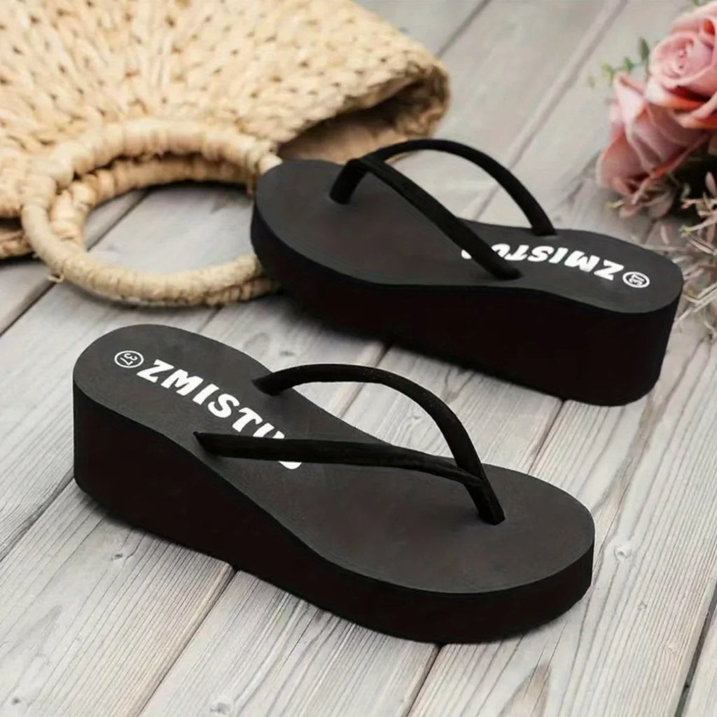 Women's summer sandals with platform, wedge design and flip-flop style.